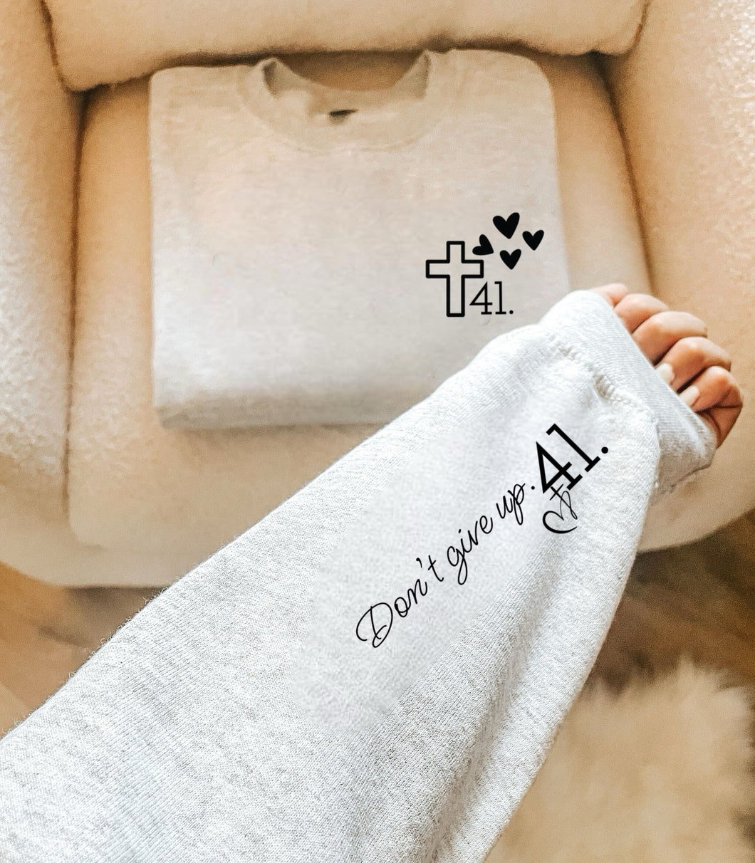 41 - Cross w/ Hearts (Left Chest) 41 - Don't Give Up (On Sleeve)