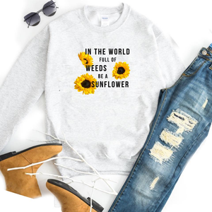 In The World Full Of Weeds Be A Sunflower